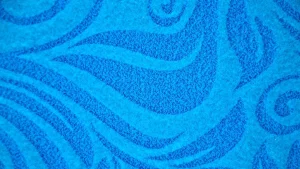 Gros plan d'une laine polaire bleu avec un motif